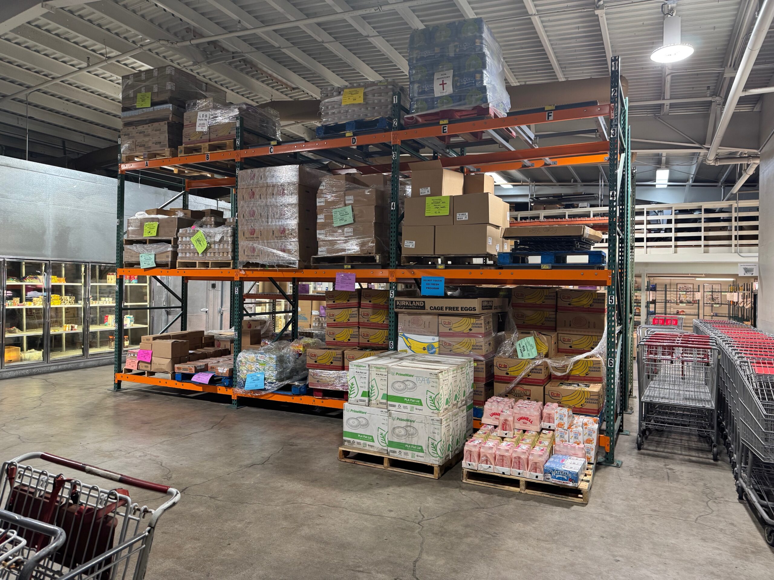 Boxes of food were stacked high at the Maui Food Bank's Wailuku warehouse on Thursday. HJI / ROB COLLIAS photo