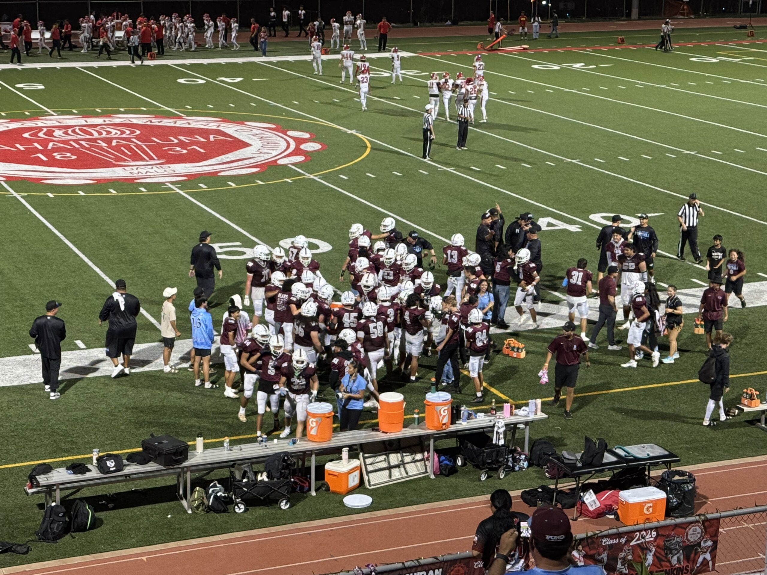The Baldwin High School football team celebrates its 14-7 win over Lahainaluna on Saturday in Lahaina. The Bears have a Gatorade coller in the middle of this photo, preparing to douse coach Cody Nakamura. HJI / ROB COLLIAS photo