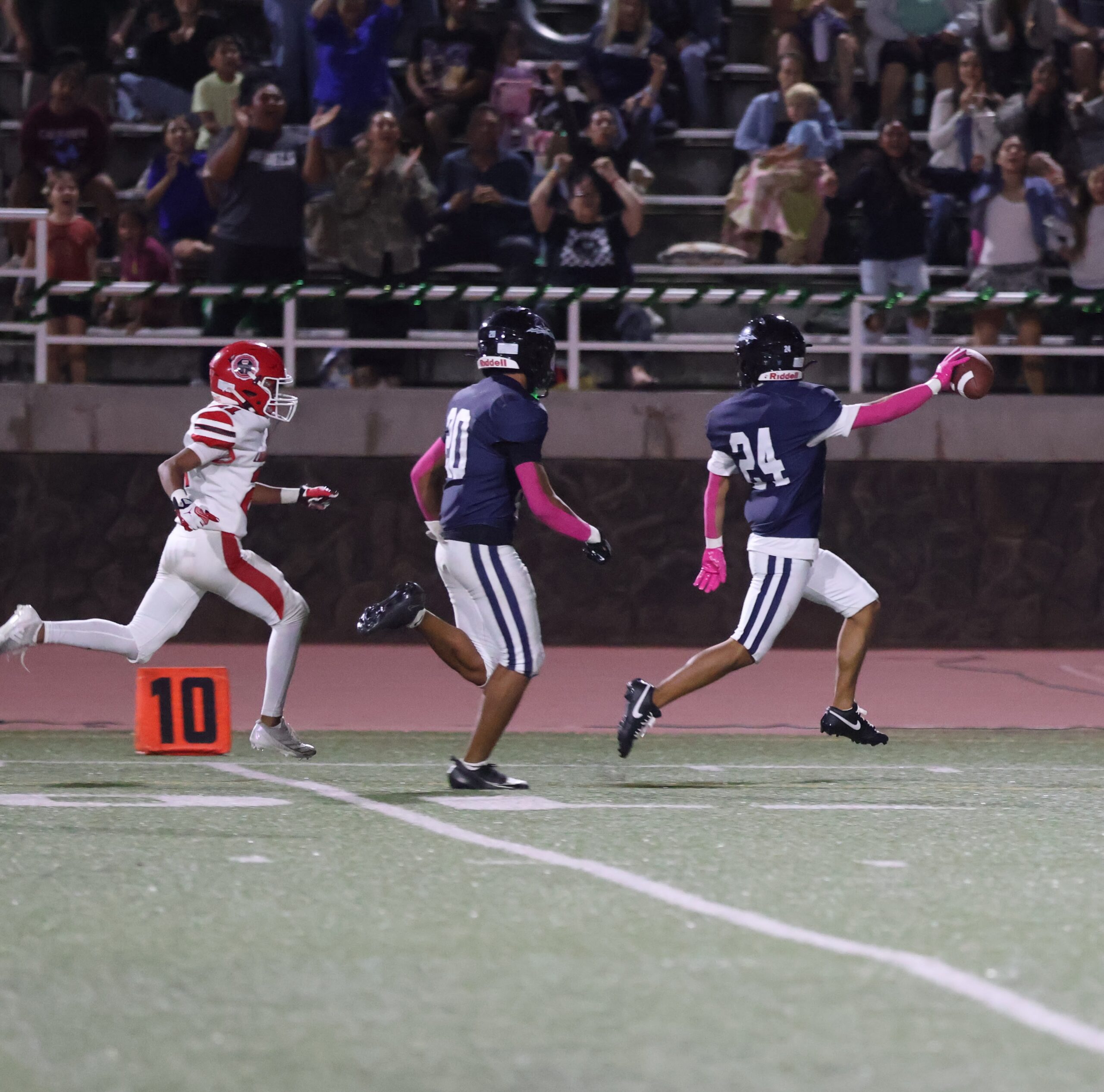 Kamehameha Schools Maui's Tali Buenconsejo (24) closes in on the end zone on his 81-yard kickoff return touchdown on Friday night at Kanaiaupuni Stadium. REID YAMAMOTO photo