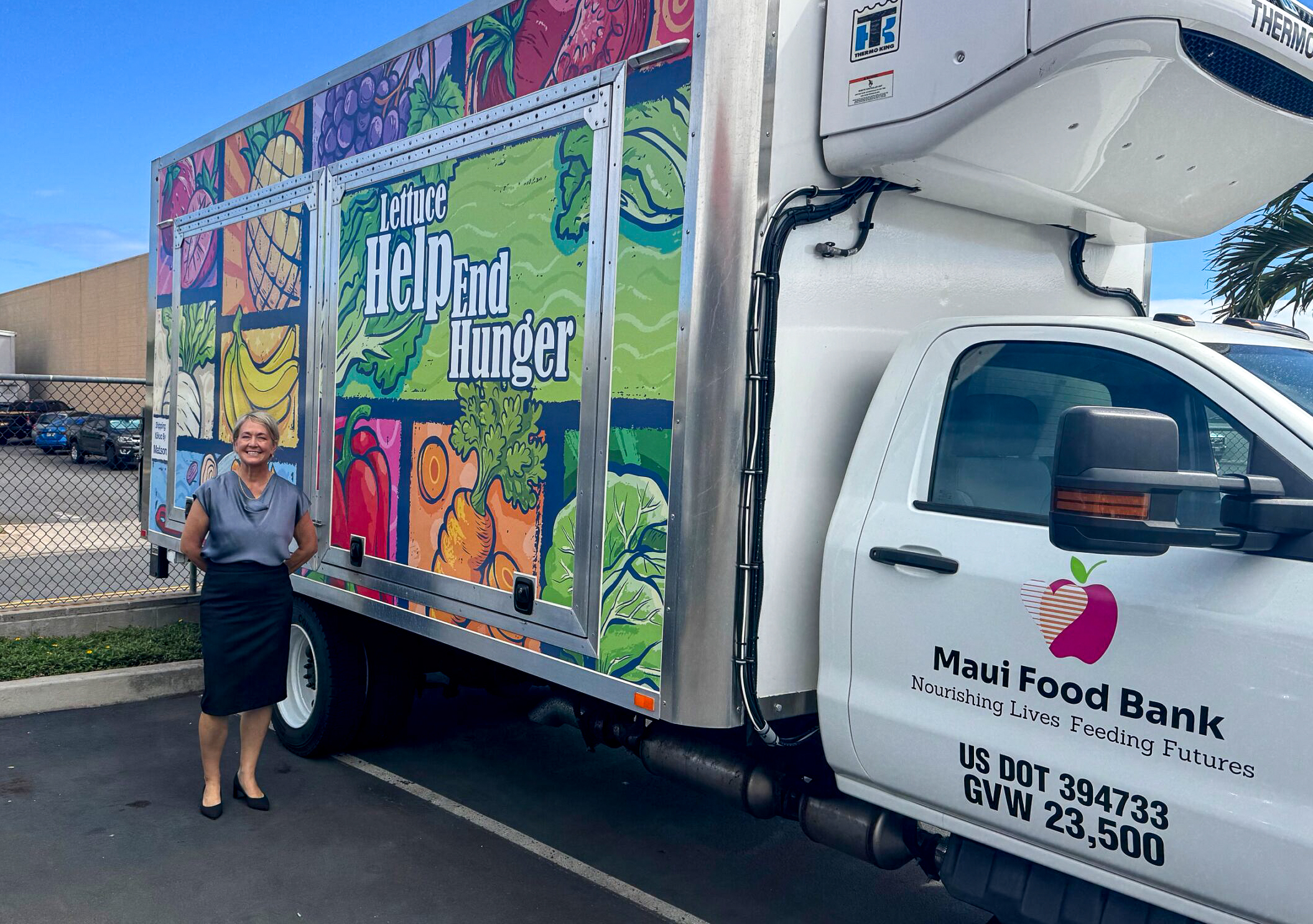 Maui Food Bank CEO Lisa Paulson stands next to a truck nicknamed "Uncle Mana," a 22,000-pound mobile market truck that goes into underserved areas on Maui: Hana, Upcountry and Lahaina. HJI / ROB COLLIAS photo
