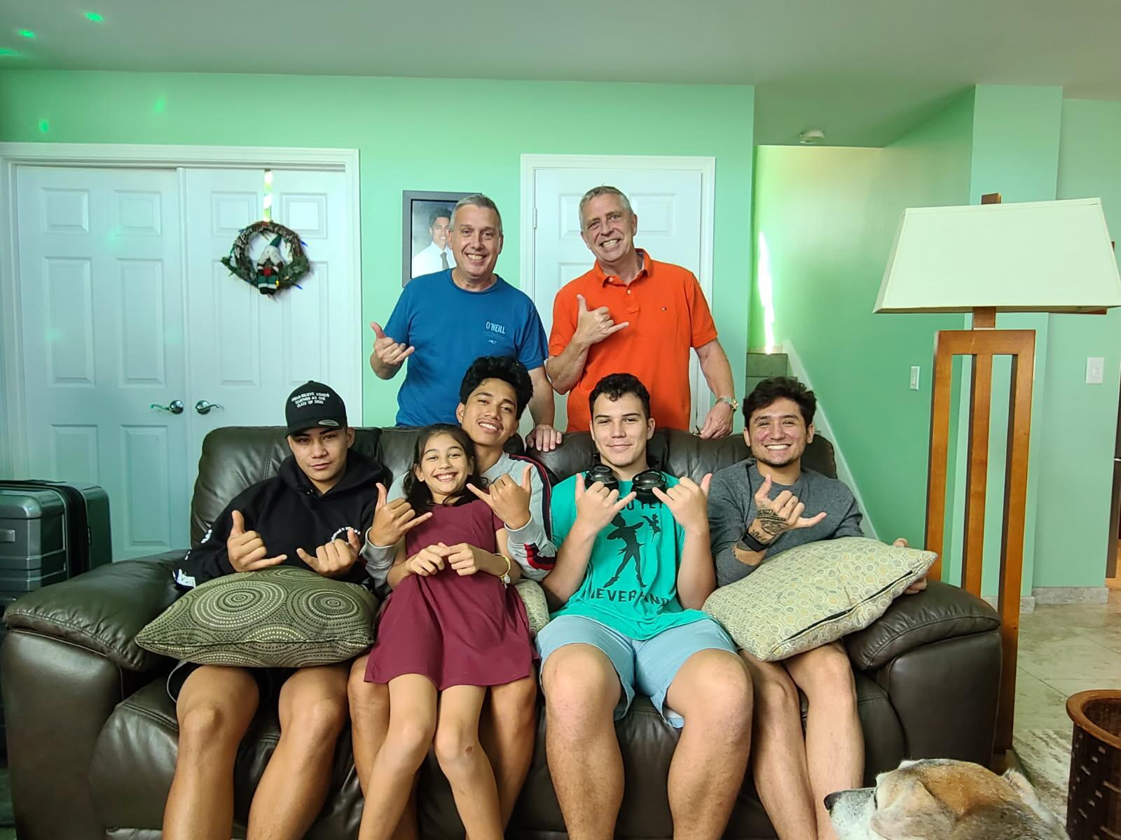 Paul Tonnessen (back right) and husband Richard Carr are shown here with five of their 32 foster children, including Nick Mendez on the far right. Courtesy photo