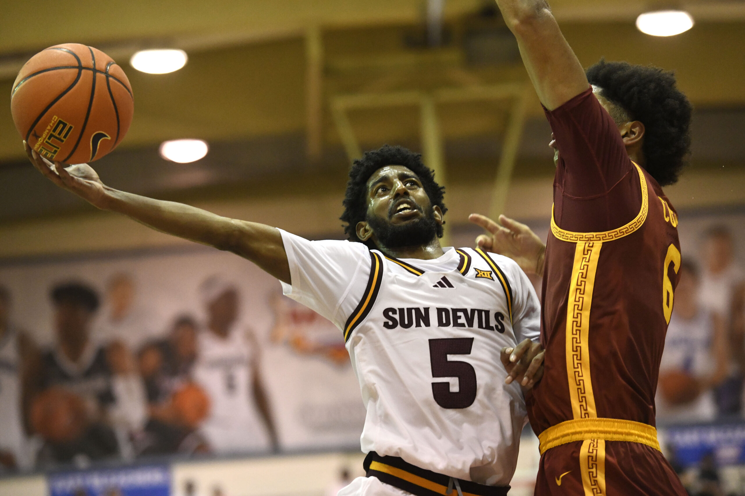 Arizona State's Moe Odum drives against USC's Jacob Cofie in the first half Wednesday. Odum led the Sun Devils with 17 points in their 88-75 loss to USC in the championship game of the Maui Invitational. MATTHEW THAYER photo