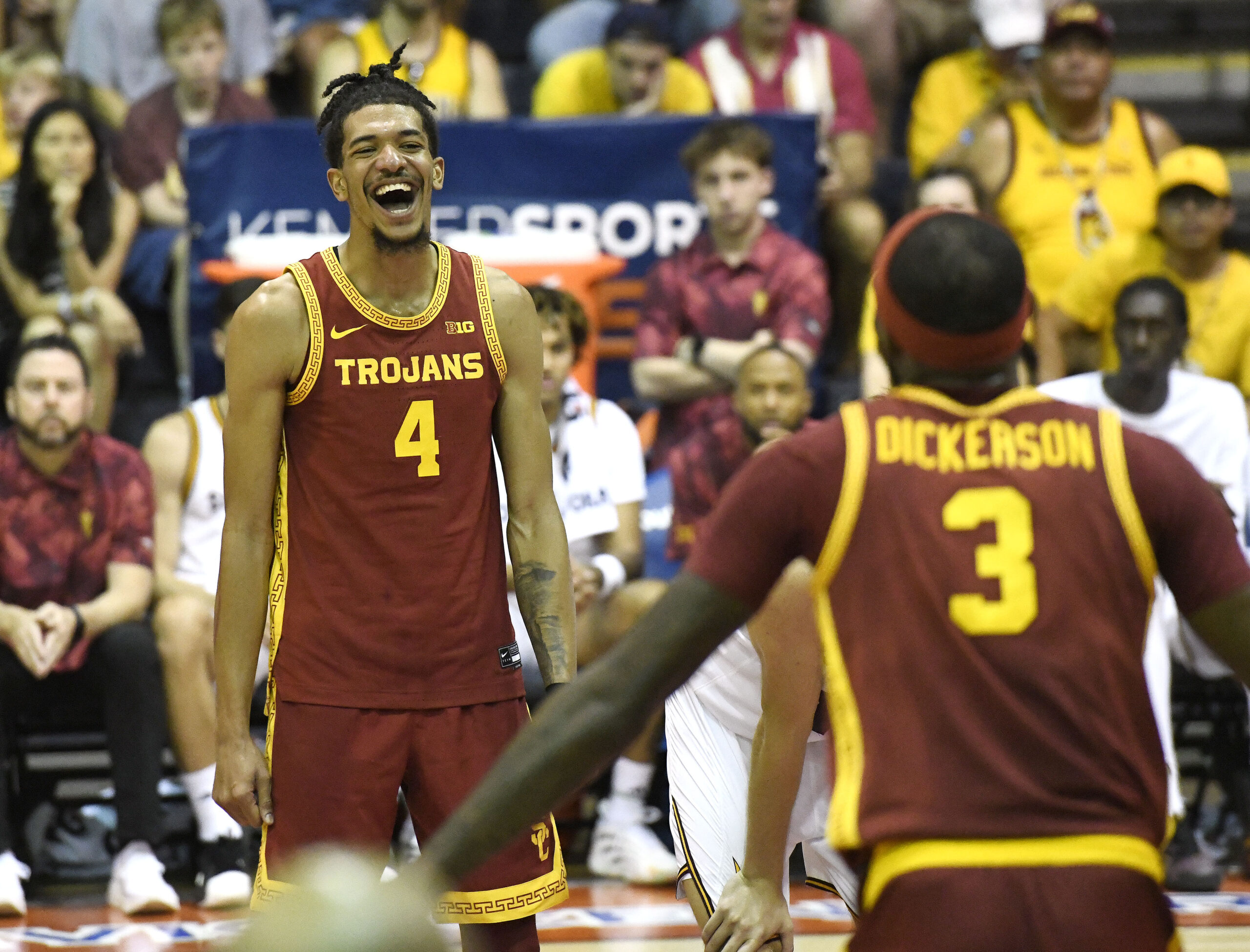 Southern California's Chad Baker-Mazara shares a smile with teammate Amarion Dickerson in the final minute of Wednesday's 88-75 win over Arizona State in the Southwest Maui Invitational championship game at Lahaina Civic Center. MATTHEW THAYER photo