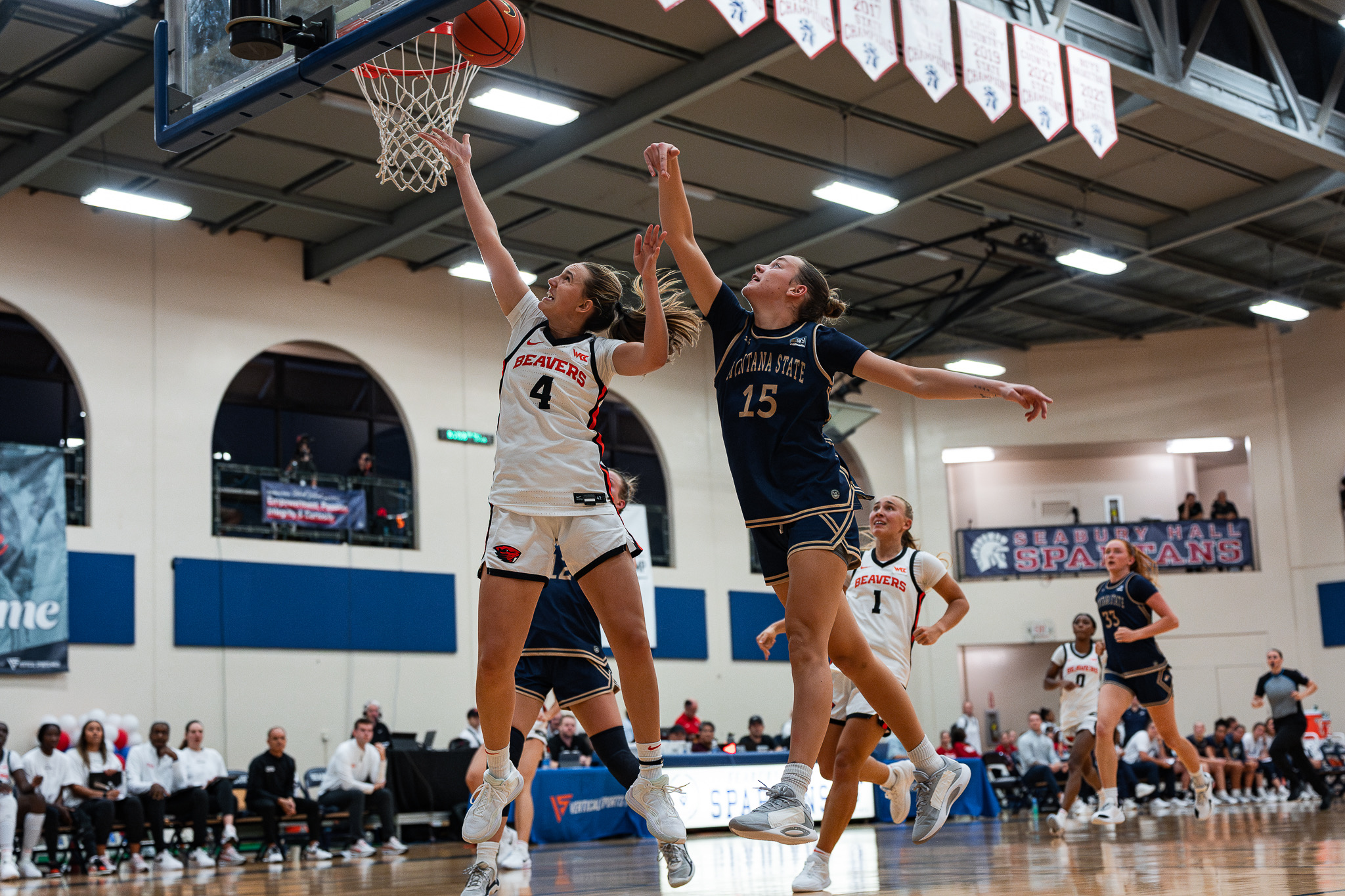 Oregon State's Ally Schimel scores on a layup past Montana State's Isobel Bunyan in the Beavers' 53-51 win in the Maui Classic. Sophia Gibson / OSU Athletics photo