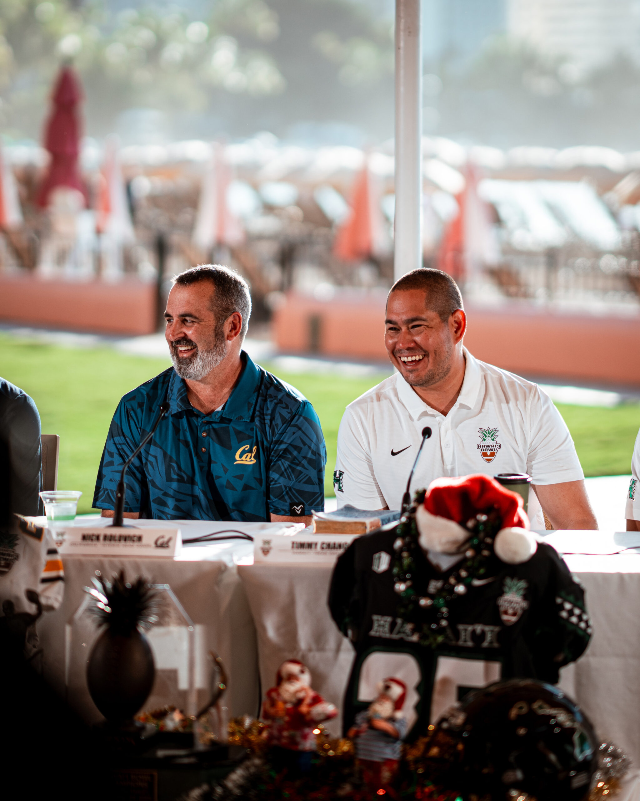 Head coaches Nick Rolovich of Cal and Timmy Chang of Hawai'i spoke at a press conference for the Sheraton Hawai'i Bowl at the Royal Hawaiian on Monday. University of Hawai'i Athletics photo