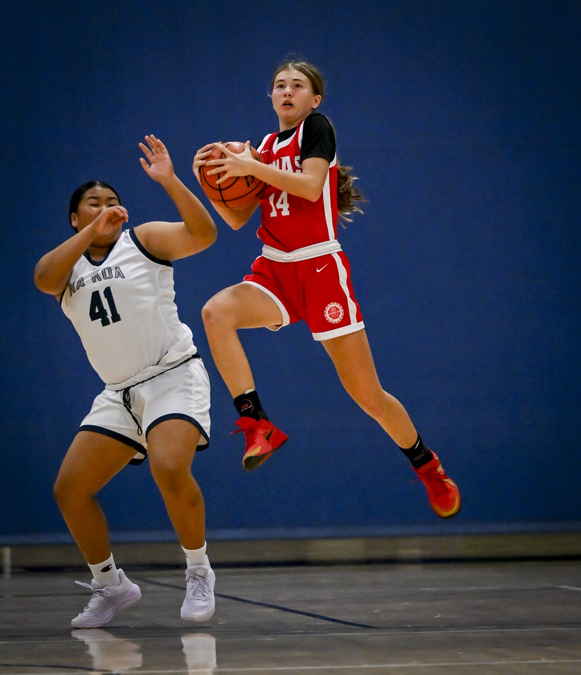 Lahainaluna High School's Jayla Chihara-Brummel grabs the ball in a game against Kamehameha Maui on Nov. 25. The Lunas will play defending MIL champion Maui High on Tuesday at Lahainaluna gym. GLEN PASCUAL photo