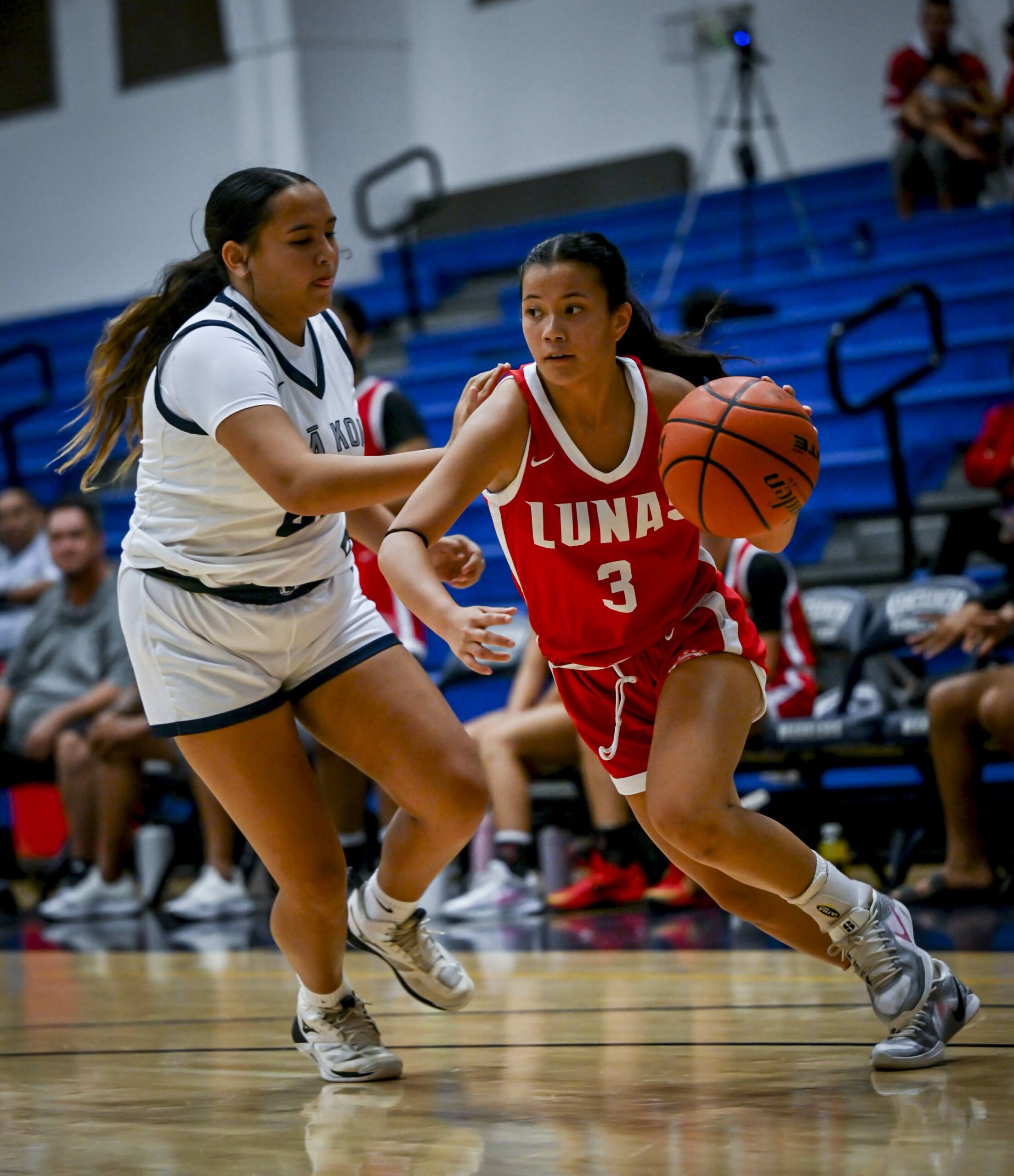 Lahainaluna High School's Constance Kaniho dribbles past a Kamehameha Maui defender earlier this season. Kaniho averages 8.3 points per game for the Lunas, who play defending MIL champion Maui High on Tuesday in Lahaina. GLEN PASCUAL photo