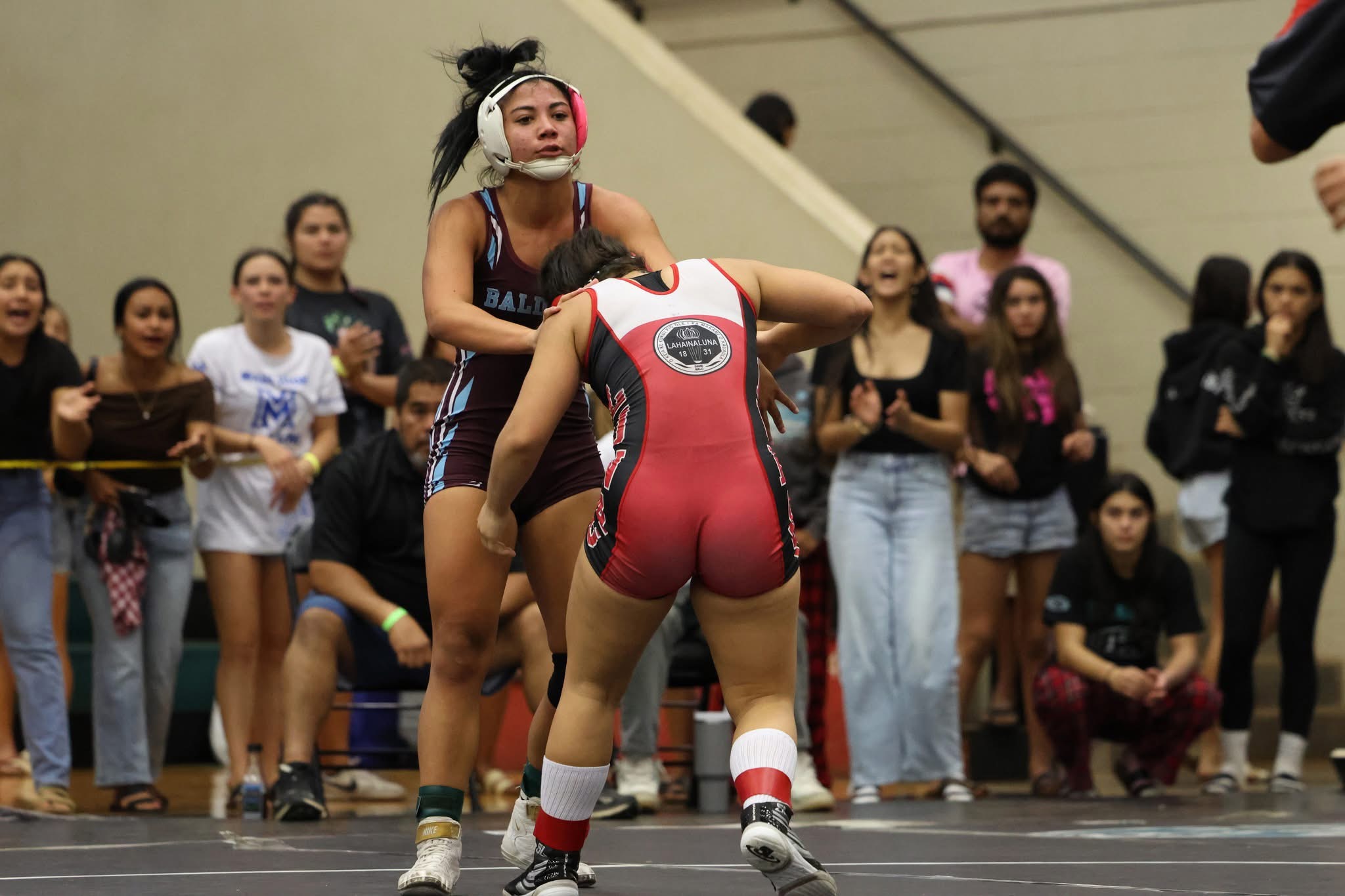 Baldwin's Teata Mata'afa Grove (left) beat Isabella Cabanilla-Okano of Lahainaluna 4-3 in their 135-pound final at the Garner Ivey Maui Invitational Wrestling Tournament on Saturday. JASON HAYASE photo