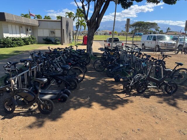 The Maui High School bike racks had 30 e-bikes, 10 regular bicycles, and 6 e-scooters on Wednesday. HJI / ROB COLLIAS photo