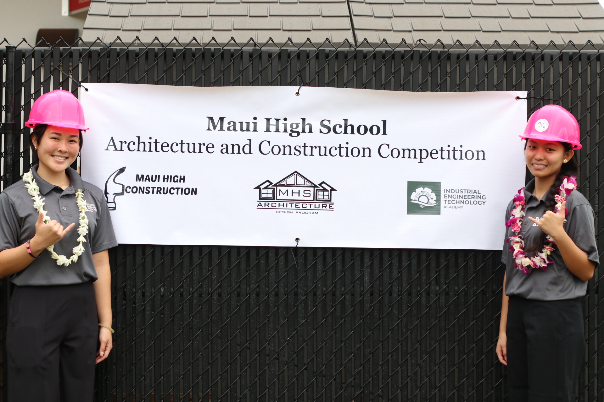 Maui High School seniors Kaylee Yagi (left) and Jamaeia Espanol organided an architectural design competition and construction showcase at the Kahului school on Friday, the first of its kind in Maui County. AARON OMURO photo