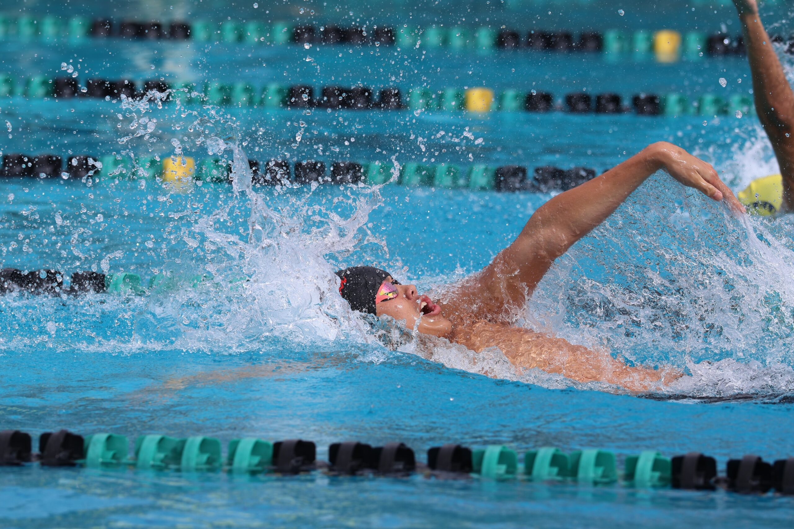 Lahaina Swim Club's Cruz Storer swims the backstroke at the Hawai'i Senior Championships held Nov. 21-23 on O'ahu. REID YAMAMOTO photo