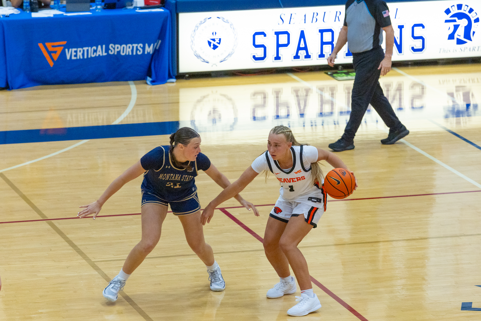 Oregon State's Kennedie Shuler drives against Montana State's Brianne Bailey in the Beavers' 53-51 win on Friday night at Seabury Hall in a Maui Classic women's basketball game. Bryan Berkowitz / Seabury Hall.photo