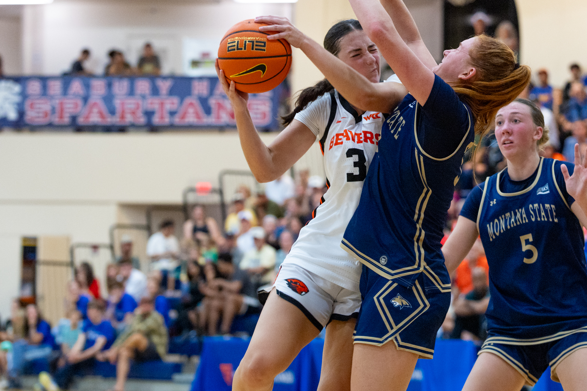 Oregon State's Jenna Villa (3) goes hard to the hoop against Montana State in the Beavers' 53-51 win. Bryan Berkowitz / Seabury Hall photo