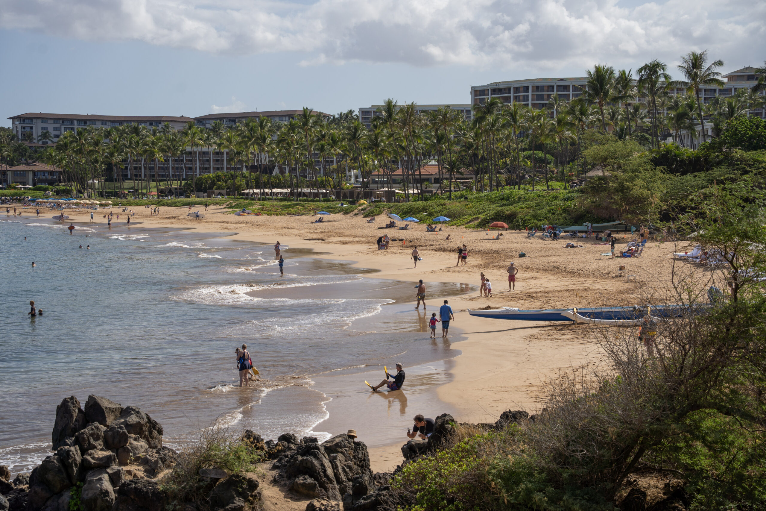 Tourists mingle in the waters off Wailea Beach in June. HJI / COLLEEN UECHI photo