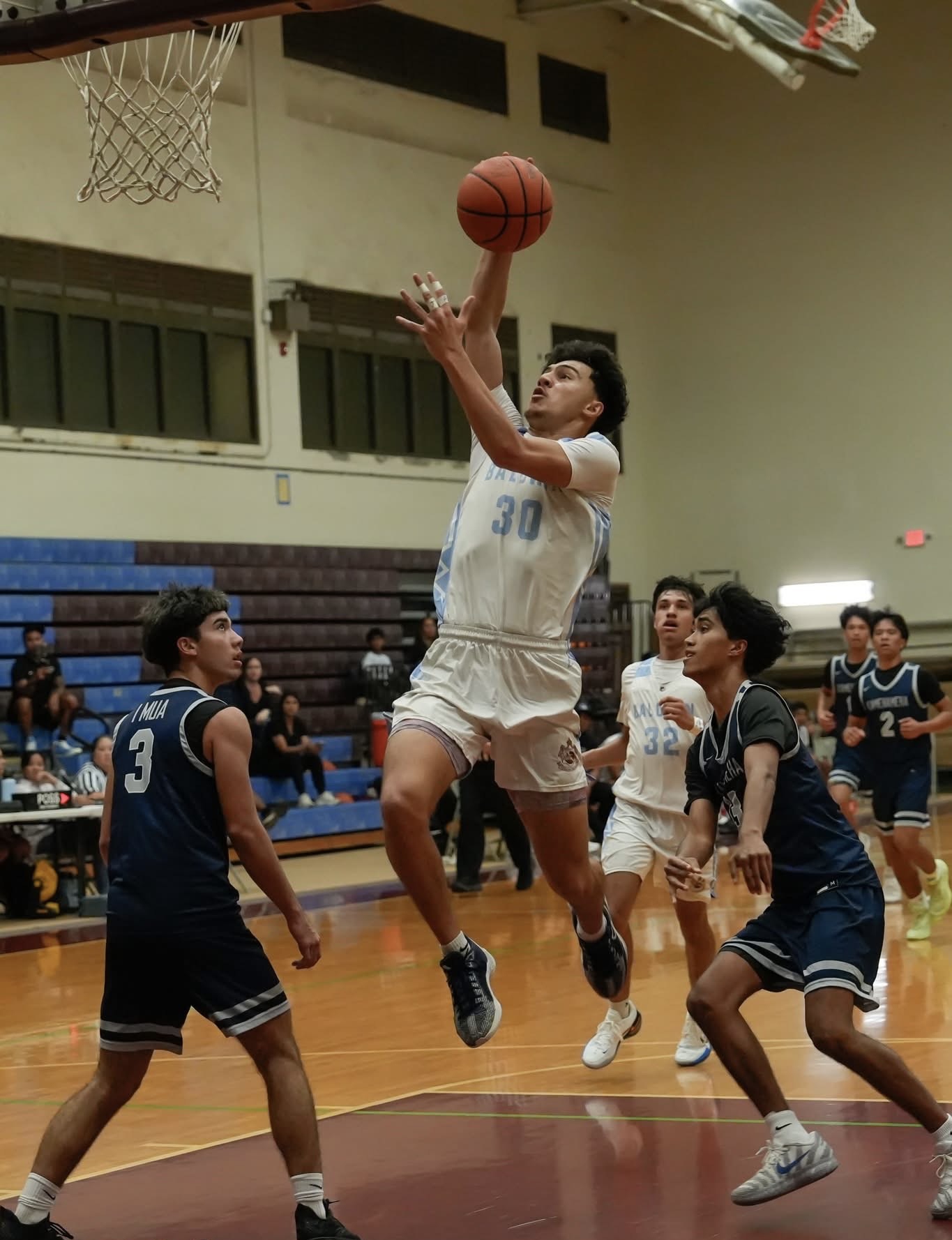 Baldwin High School's Dylan Kuia goes to the hoop against Kamehameha Maui in a game at Jon Garcia Gym earlier this season. KIM TENGAN photo