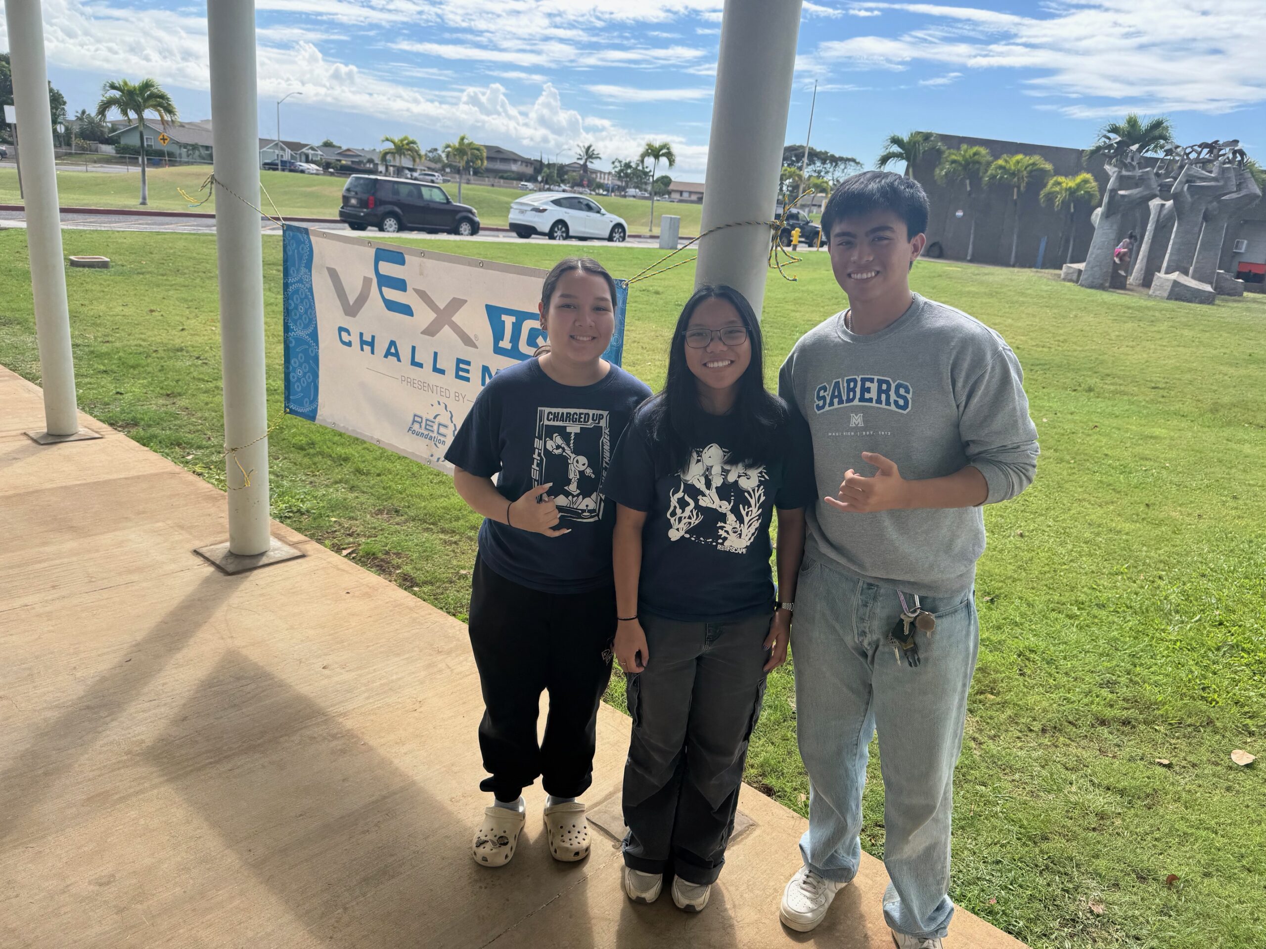 From left, Maui High School seniors Alaina Hook, Aleizay Angel and Dominick Guiwa were student ambassadors for the VEXIQ Robotics Championships of the Valley Isle Mixed League on Jan. 24 at Maui High School. HJI / ROB COLLIAS photo