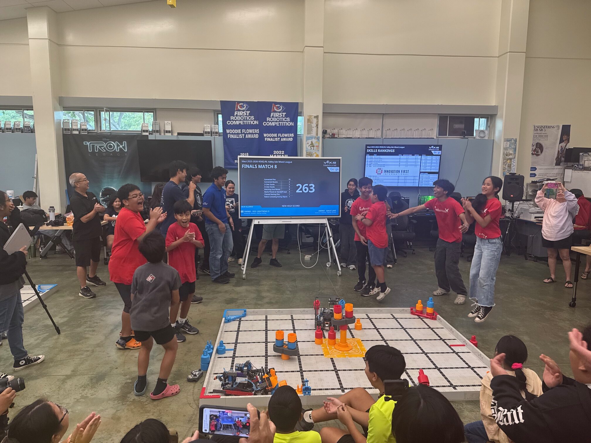 The Teamwork Champions from Maui Waena Intermediate School celebrate their high score after their finals match at the VEXIQ Valley Isle Mixed League Championships on Saturday, Jan. 24, at the Maui High School STEM building. HJI / ROB COLLIAS photo
