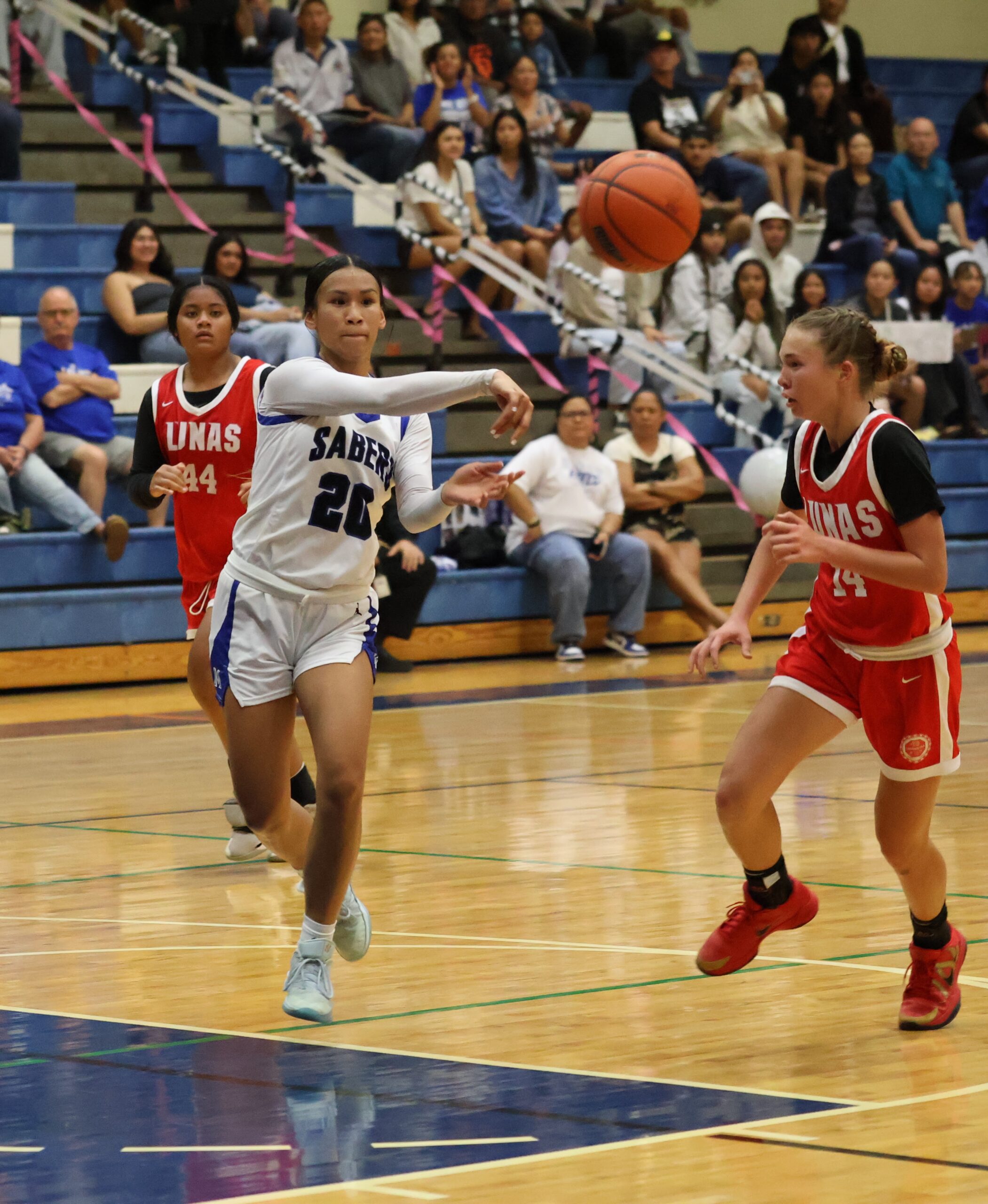 Maui High School senior Naiara Bal passes the ball on Tuesday, Jan. 20, 2026, during her senior night game against Lahainaluna. The Sabers won the game 53-11 at the Izumi "Shine" Matsui Athletc Center. REID YAMAMOTO photo