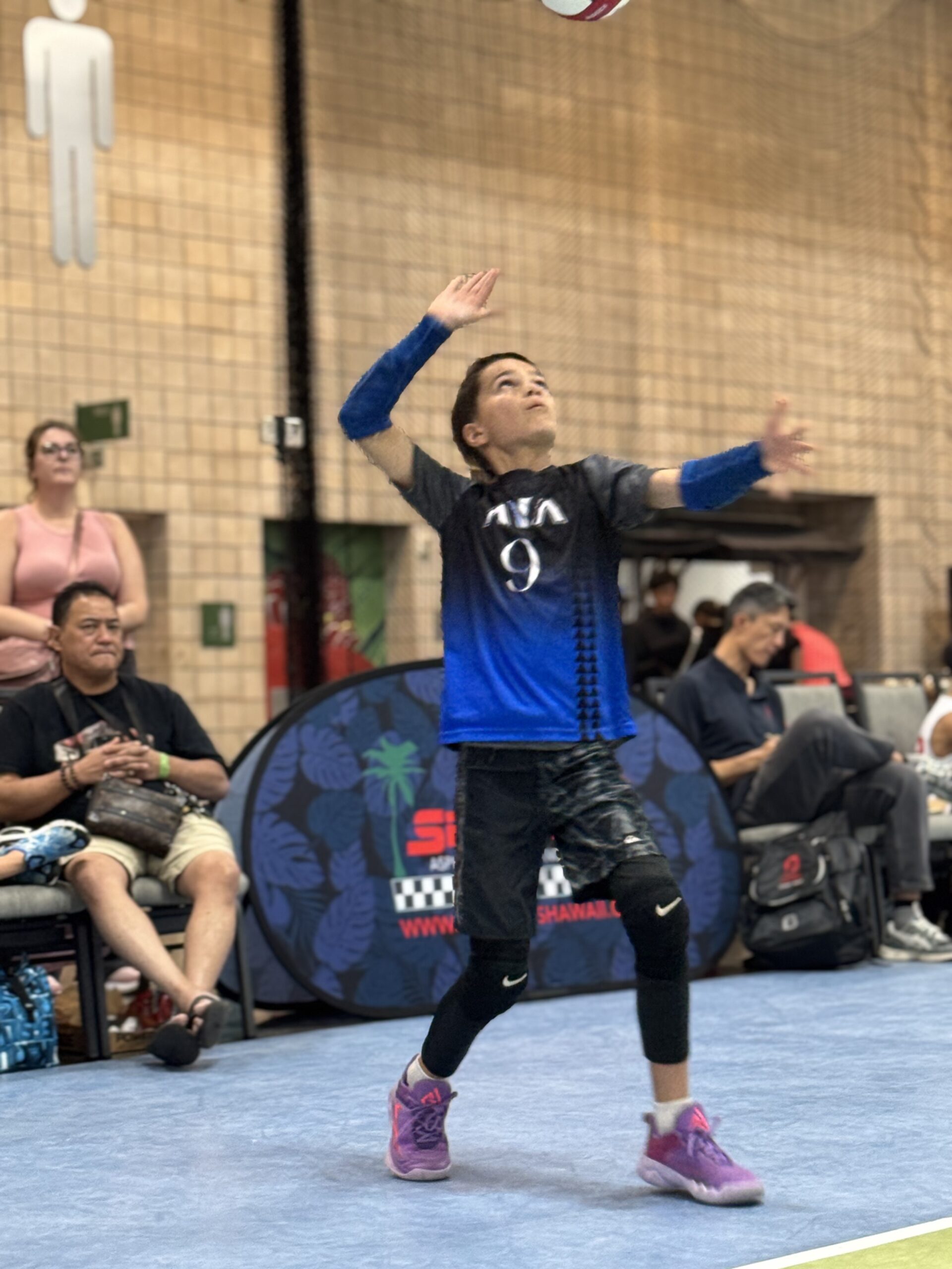 La'akeaokalani Padilla serves at the TransPacific Volleyball Championships over the weekend. His work behind the line was key to the Aloha Volleyball Association's 14-under boys team championship. Courtesy photo