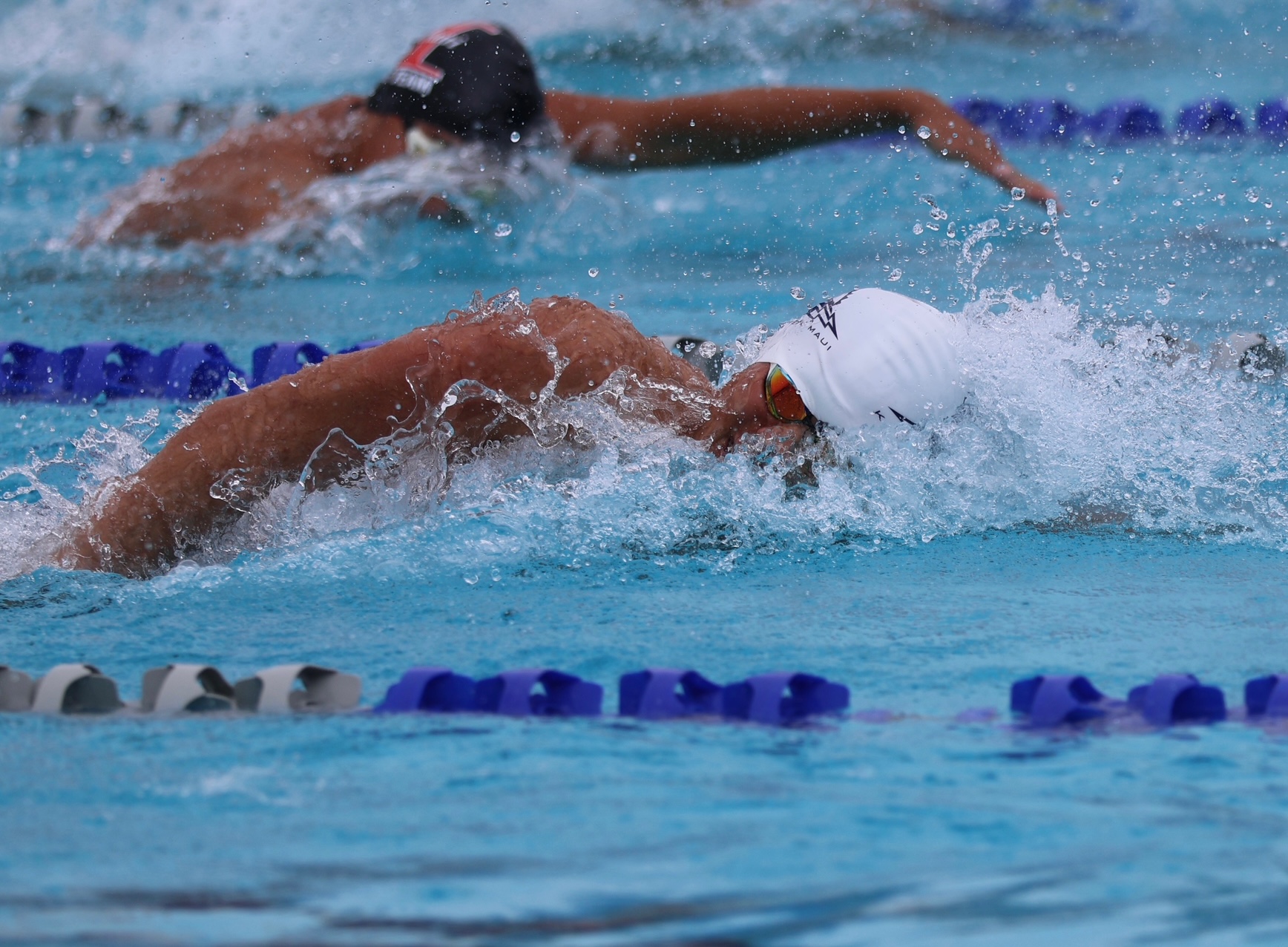 Kamehameha Schools Maui sophomore Cruz Storer swims the 50-yard freestyle at the HHSAA/K. Mark Takai state swimming and diving championships on Saturday. Storer won both the 50- and 100-yard freestyles to become the first Kamehameha Maui state champion in swimming. REID YAMAMOTO photo