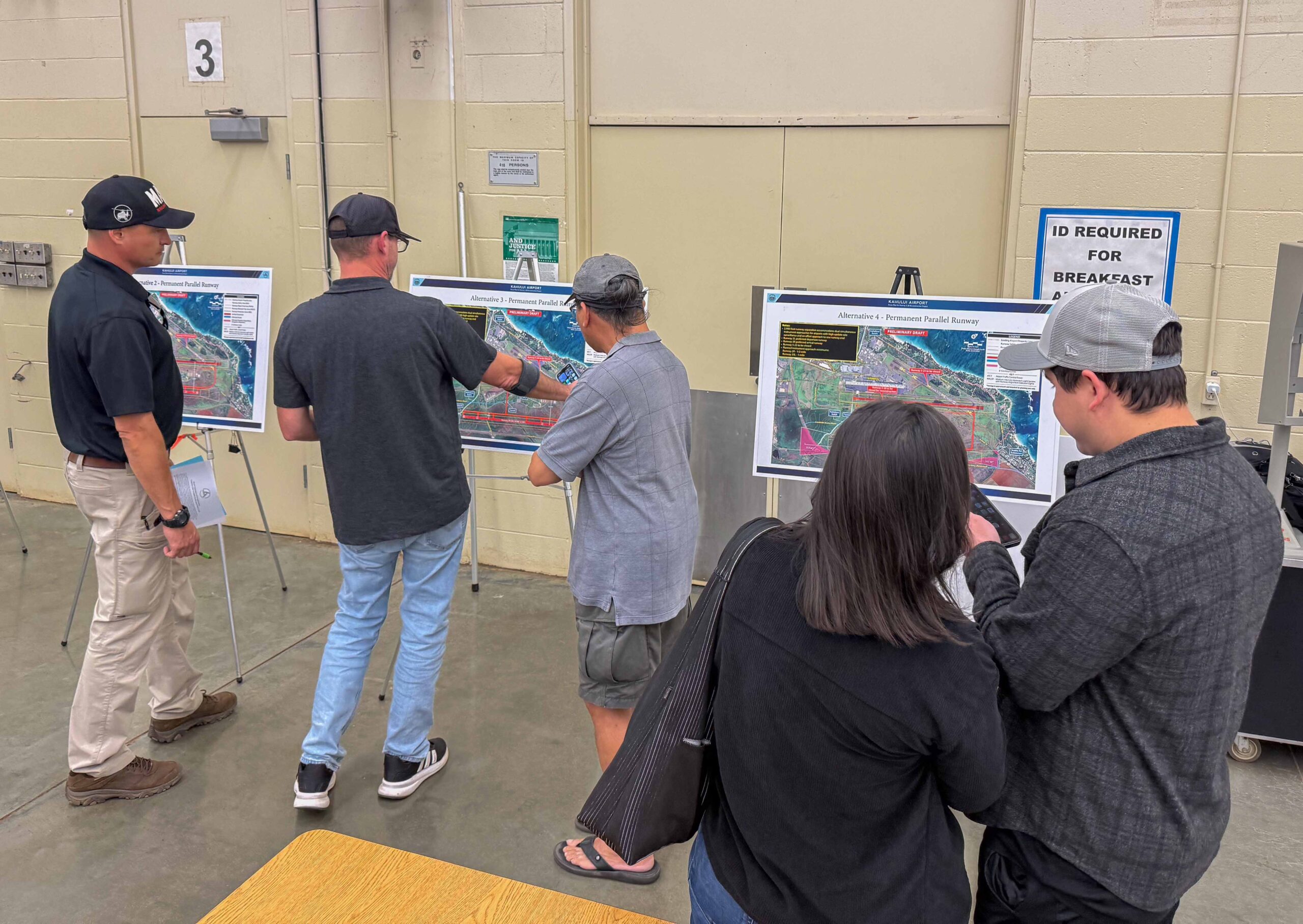The four proposed alternatives to reconstruct Runway 2-20 at Kahului Airport were presented during a public meeting on March 2 at Maui High School. Cammy Clark / HJI