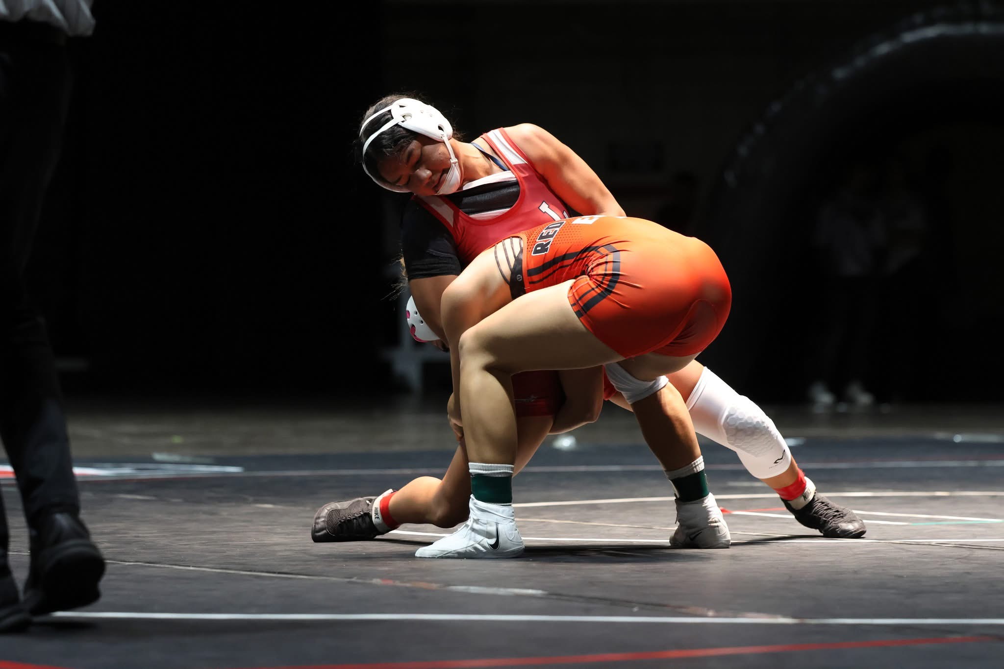 Lahainaluna High School senior Siana Boaz-Vasquez handles Kahuku's Leila Esera in Boaz-Vasquez's 18-5 win in the state girls 140-pound state championship match on Saturday. JASON HAYASE photo
