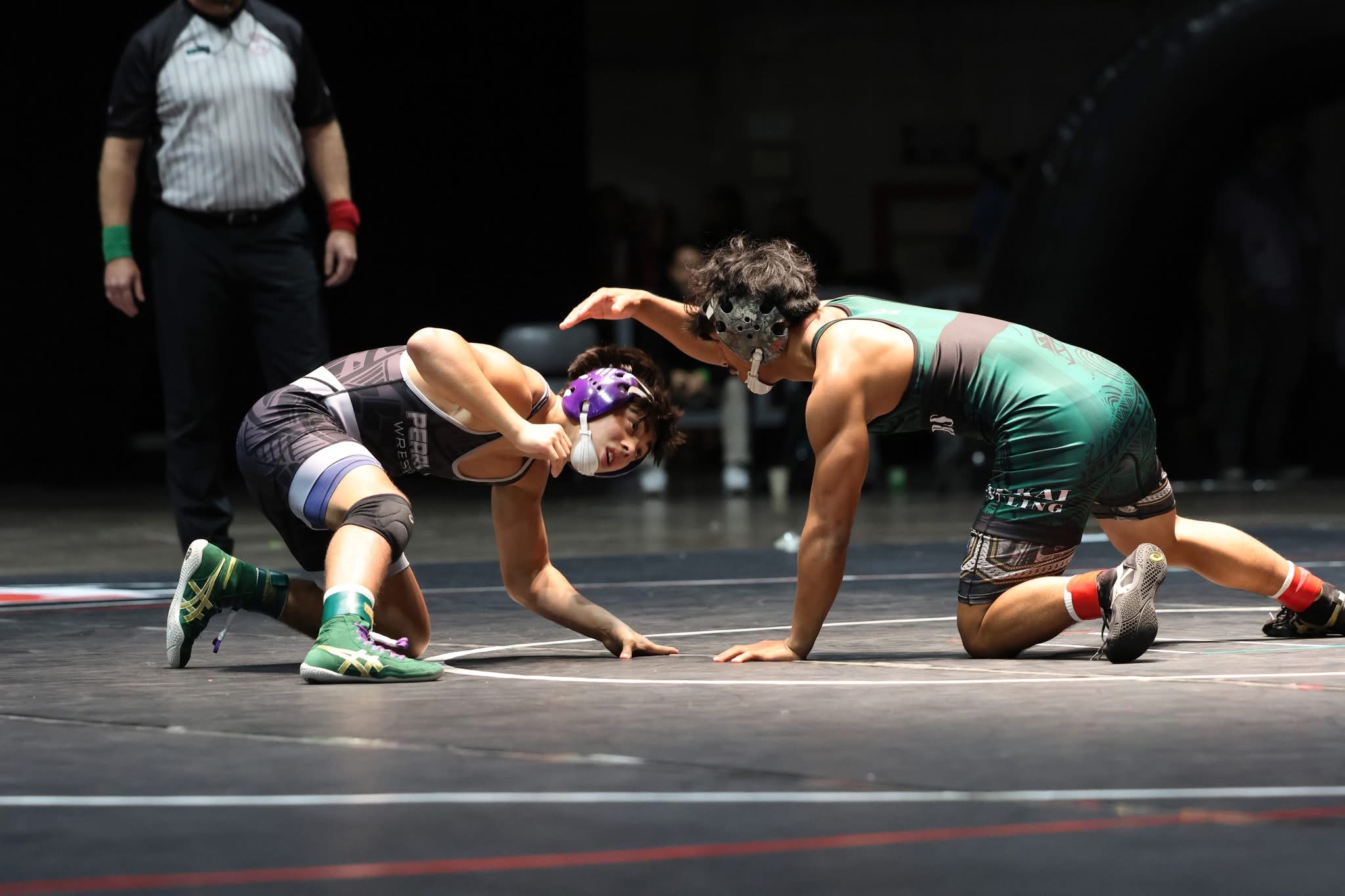 Jona Dudoit (right) won Moloka'i High School's first boys state wrestling title in 21 years on Saturday night on O'ahu. JASON HAYASE photo